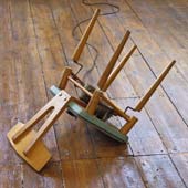 Monument to the Isms (upturned walking chair).